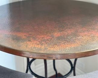 Stamped Copper Top Bistro Table with Wrought Iron Pedestal. Measures 42" D x 41" H. Photo 2 of 2.
