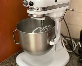 Kitchen Aide white stand mixer.