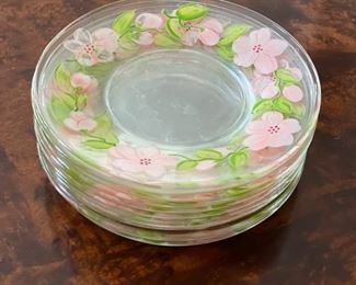 Set of 8 hand-painted glass bread plates.