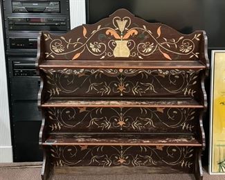 Antique stenciled wall-mount shelving unit. Photo 1 of 2.