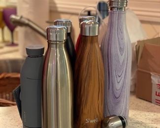 Assorted Swell water bottles.