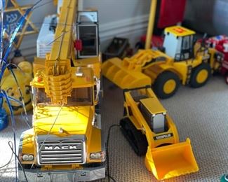 Assorted toy trucks.