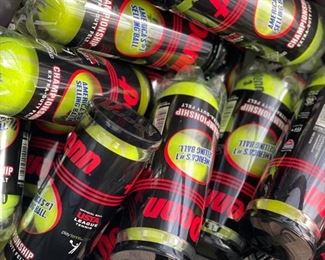 Cans and cans of tennis balls.