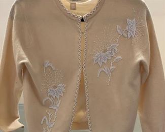 Vintage wool cardigan with beaded flower detailing. Photo 1 of 2.