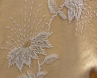 Vintage wool cardigan with beaded flower detailing. Photo 2 of 2.