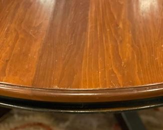60" D x 29" H dining table with ebony base and walnut top. Photo 1 of 2.
