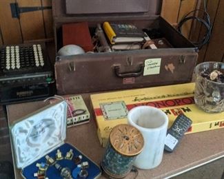 Rolliflex camera with supplies and burroughs calculators