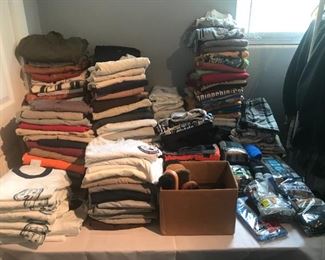 Lots of men's clothing - most are size Medium. T-shirts, short and long sleeve button downs, and polo shirts.