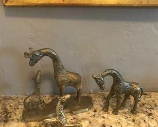 Set of 4 brass giraffes $55