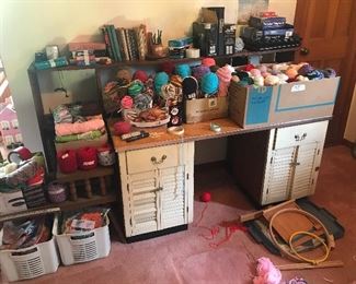 MORE Skeins of yarn and note that put together desk