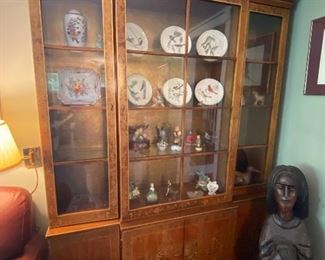 Another photo of the Oriental China Cabinet showing contents inside.