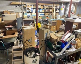 basement full of tools and supplies before organization