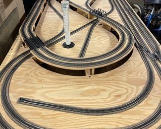 H scale train layout on plywood with transformer, two tracks.  Various engines, cars and buildings available