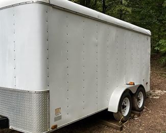 17' X 7' OUTSIDE BOX DIMENSIONS OF TANDIUM TRAILER WITH DOUBLE BACK DOOR, BRAKING SYSTEM AND SIDE ENTRANCE.