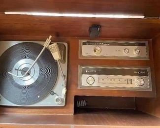 Zenith 1960's (mid century)stereo system with attachment for head phones, needs some restoration work, great piece for it's age.