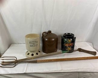 Crock Poultry Feeder, Brown Whiskey Bottle, Pitchfork, And Weed Wacker