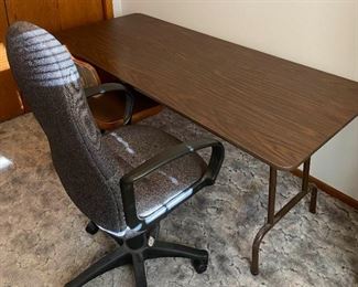 Table and Two Office Swivel Chairs