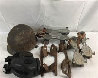 Vintage Skates, Army Helmet, and Gas Mask