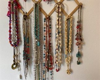 Wall Rack Loaded With Costume Jewelry