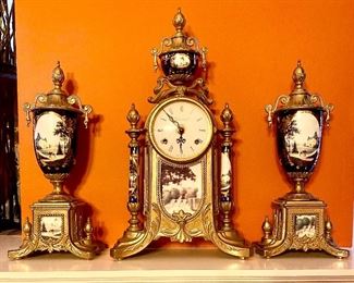 3 piece Garniture set. Mantle Clock and urns