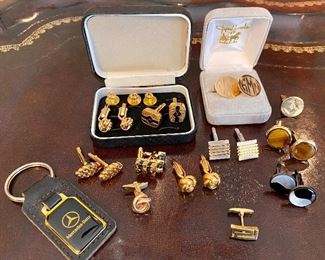 Cufflinks , pins and Mercedes key chain