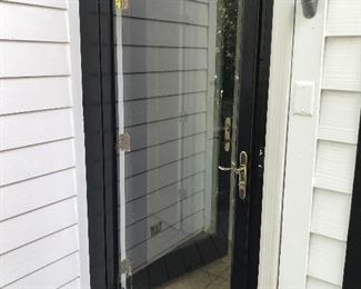 $250 -- Marvin exterior door with storm door sized 35" x 79"