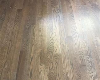 Oak hardwood floors installed in 2020 in color "griege" priced at .65 per square foot