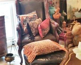 Black Leather Wood Trimmed Chair With African Pillows and Ottoman
