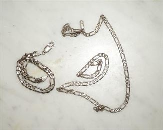 silver bracelet and necklace