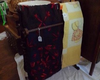 several quilt racks & many quilts