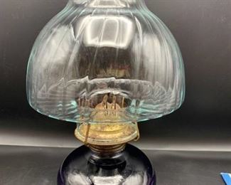 Vintage Clear Glass Oil Lamp with Blue Oil and Swirled Glass Globe