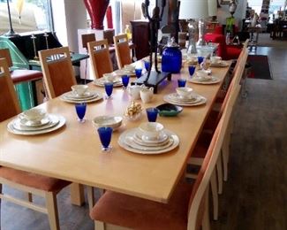 Gorgeous Table that extends with. Two leaves. Apricot Upholstery on eight high back chairs