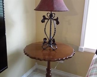 Antique tilt top table with scalloped edges