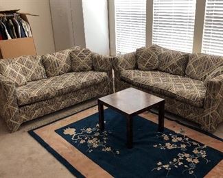 Couches, table, rug