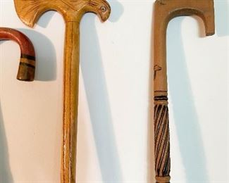 LOT #244 - $50 - Lot of 4 Carved  Wooden Canes / Walking Sticks