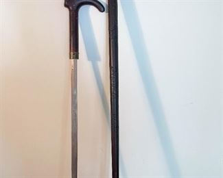 LOT #246 - $65 - Carved Wooden Cane / Walking Stick with Hidden Sword