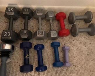 Assorted dumbbells.