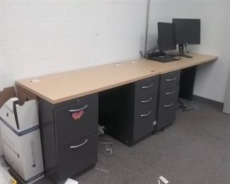 (2) 48" by 24" by 29 3/4" Wooden desks with filing cabinets and 2 dell moniters