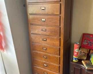 10 drawer tall wooden cabinet