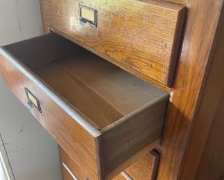 10 drawer tall wooden cabinet
