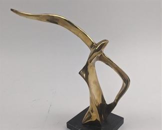 brass bird sculpture