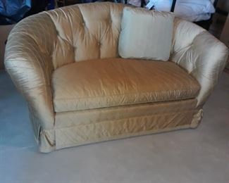 We have two of these love seats made by Baker