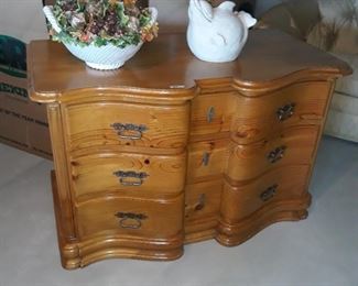 Serpentine style front on this beautiful chest by Switzer