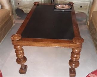 Cocktail table by Quatrain
Black stone insert table top surface