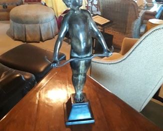 20" tall figural of boy with bow. 20" Tall