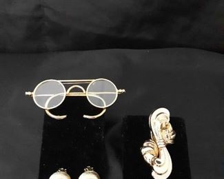 Vintage gold pins by Coro