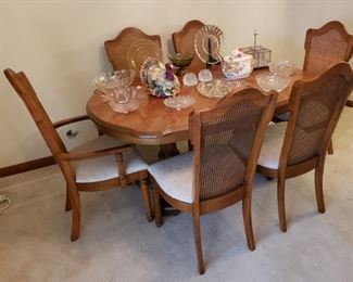 Broyhill Dining Table with 8 Cain back Chairs, Leaf and Padding