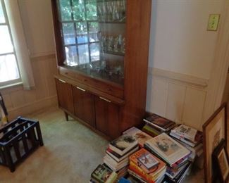 Mid Century Modern china cabinet and books