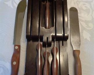 Vintage Cutco six piece set in wall block