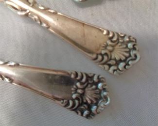 close-up of sterling silver spoons